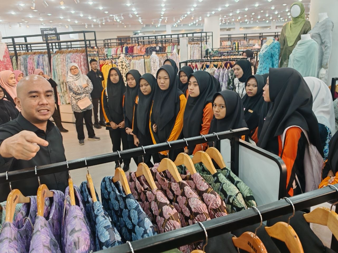Documentation from the 2026 Raya clothing and monetary aid ceremony